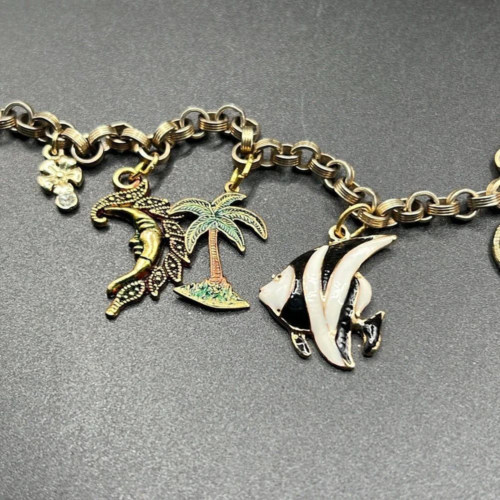 Vintage charm bracelet with 7 charms - Picture 3 of 5